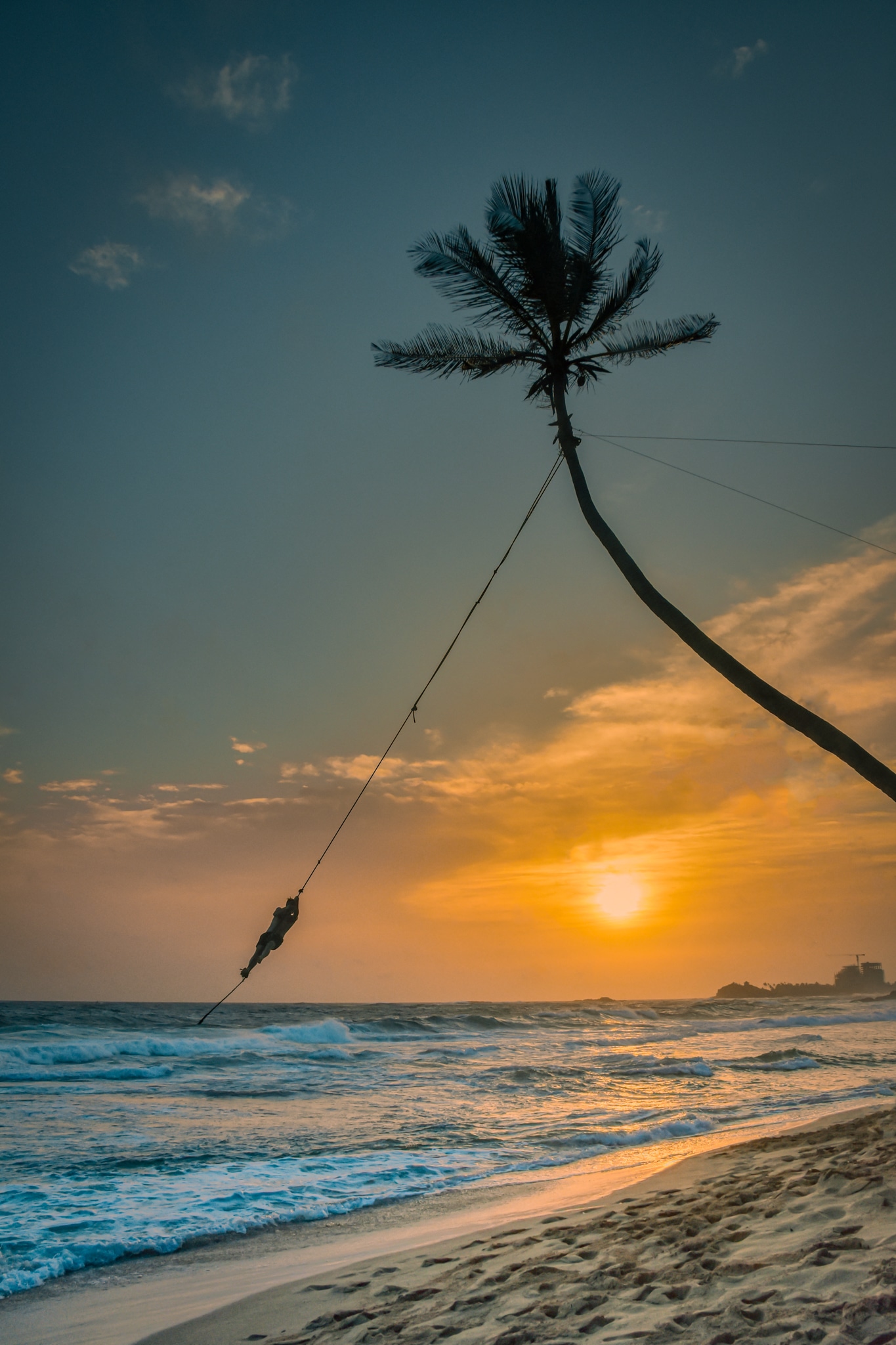 Backpacking Sri Lanka on the swing on the beach